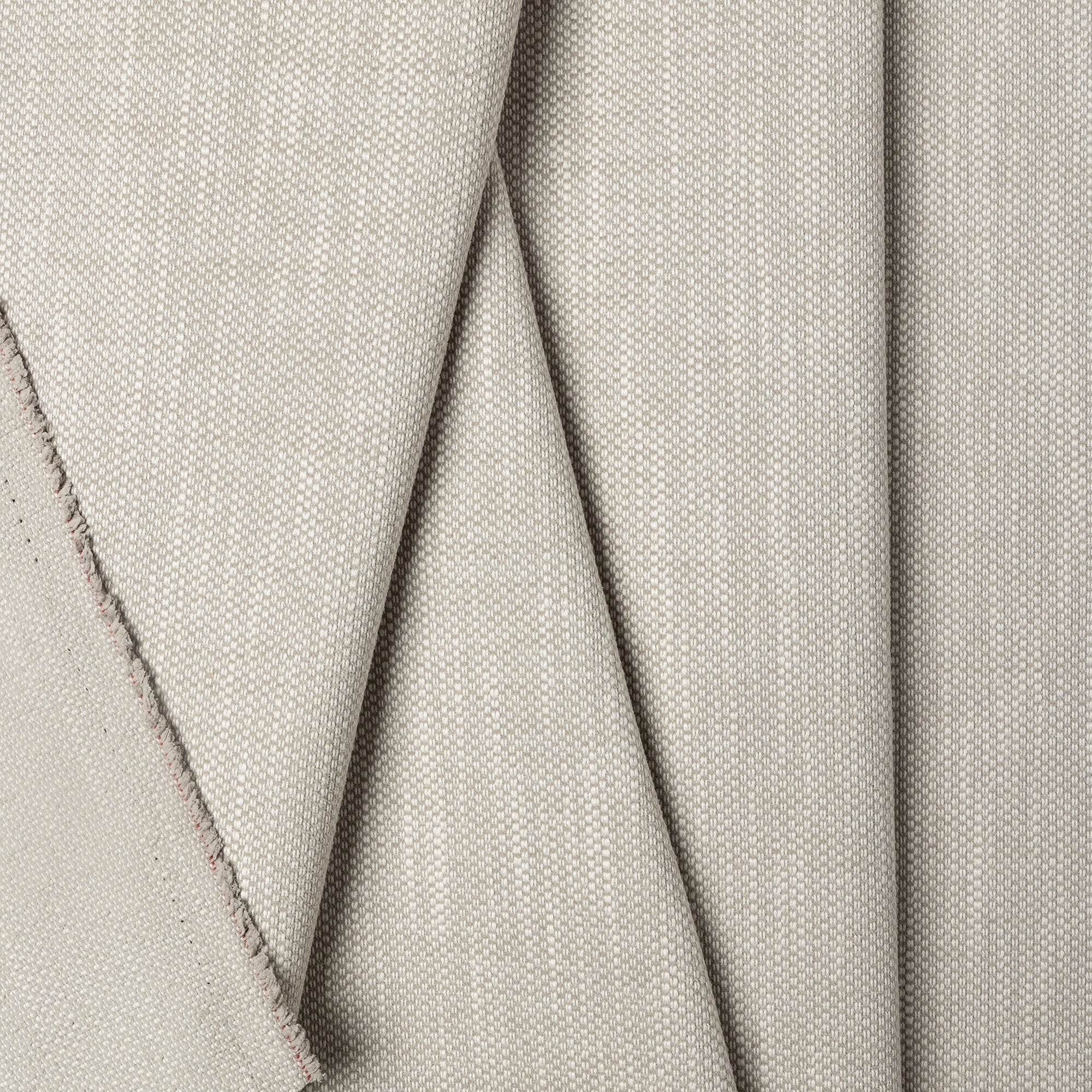 Light gray basketweave upholstery fabric by the yard, folded showing drape and weight