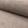 Brown basketweave upholstery fabric by the yard, rolled bolt view