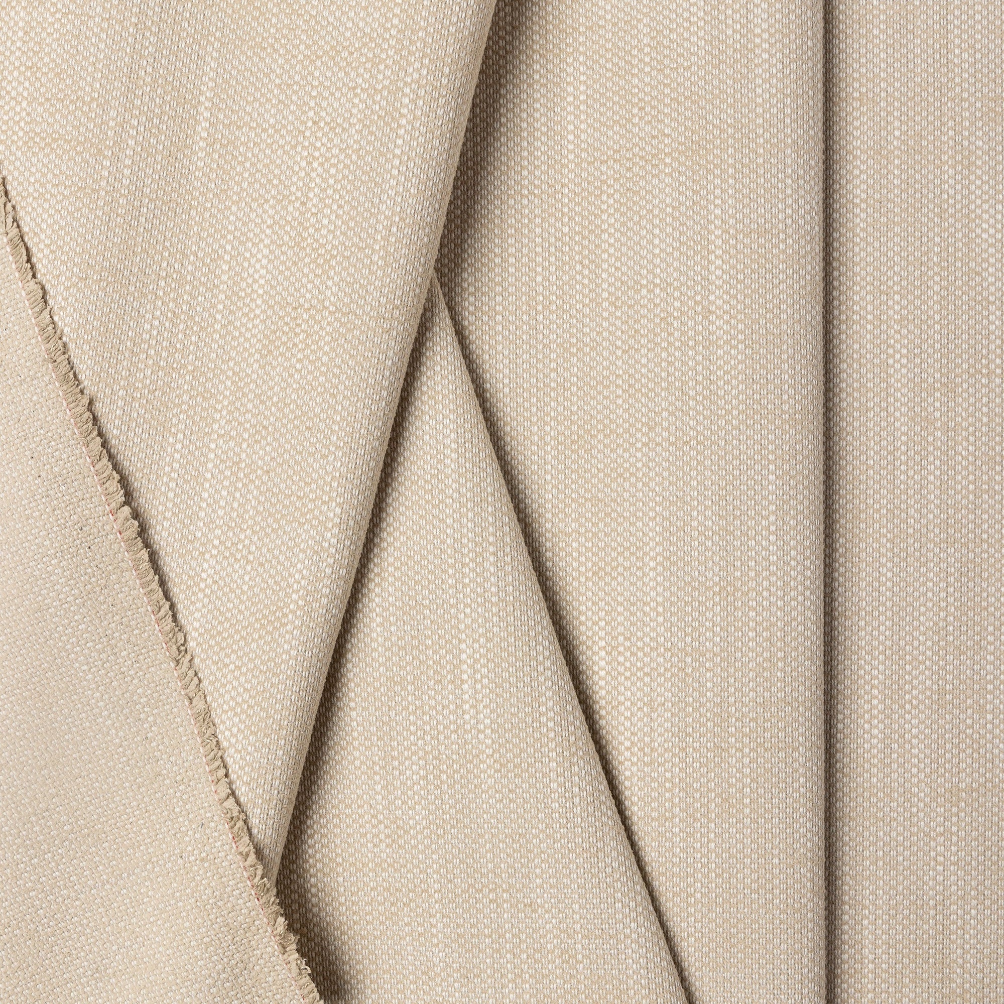 Beige basketweave upholstery fabric by the yard, folded showing drape and weight