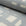 Blue and cream brushstroke crosshatch linen fabric by the yard, rolled bolt view