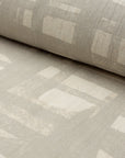 Natural cream brushstroke crosshatch linen fabric by the yard, rolled bolt view