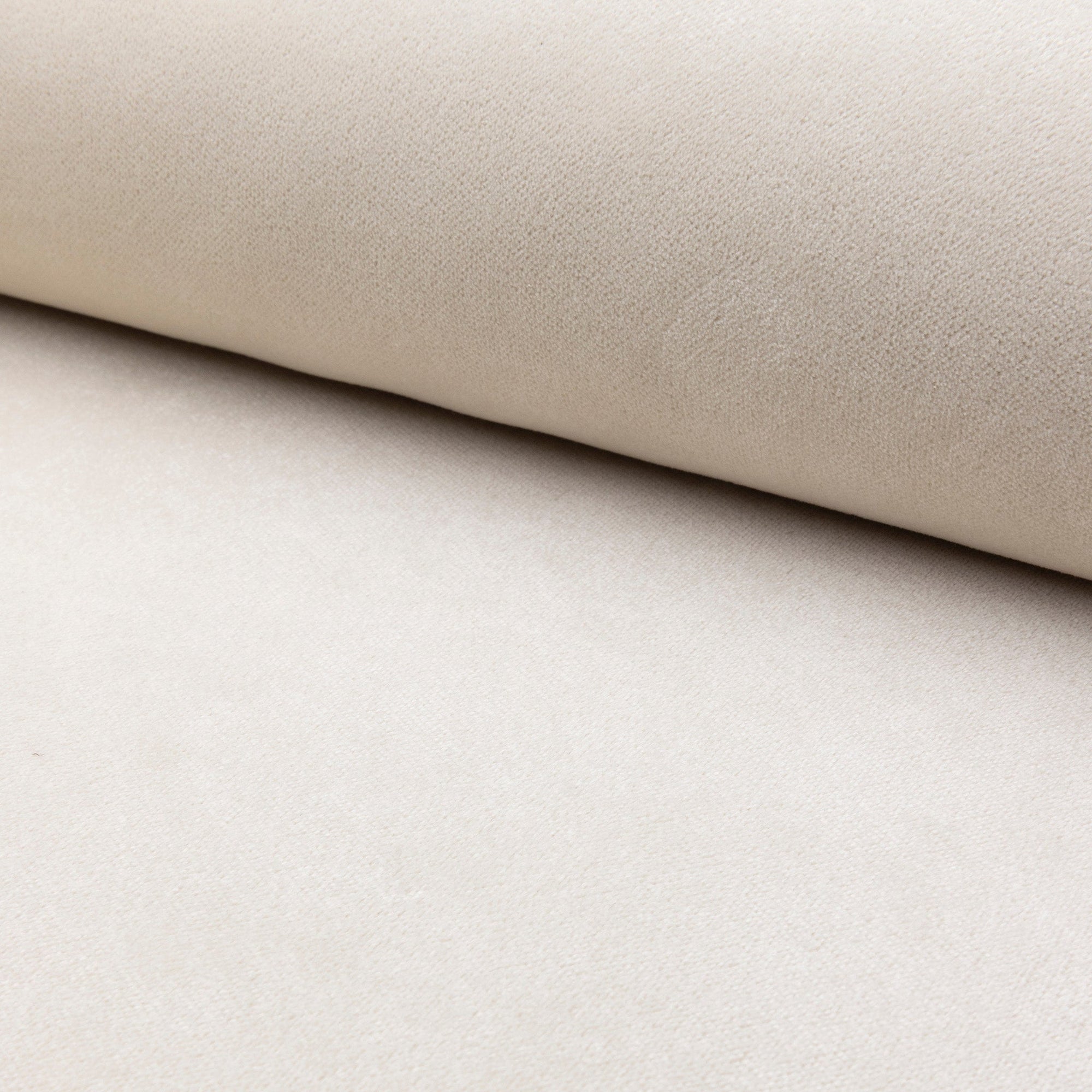 Cream velvet upholstery fabric by the yard, rolled bolt view