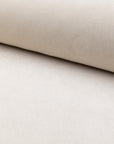 Cream velvet upholstery fabric by the yard, rolled bolt view