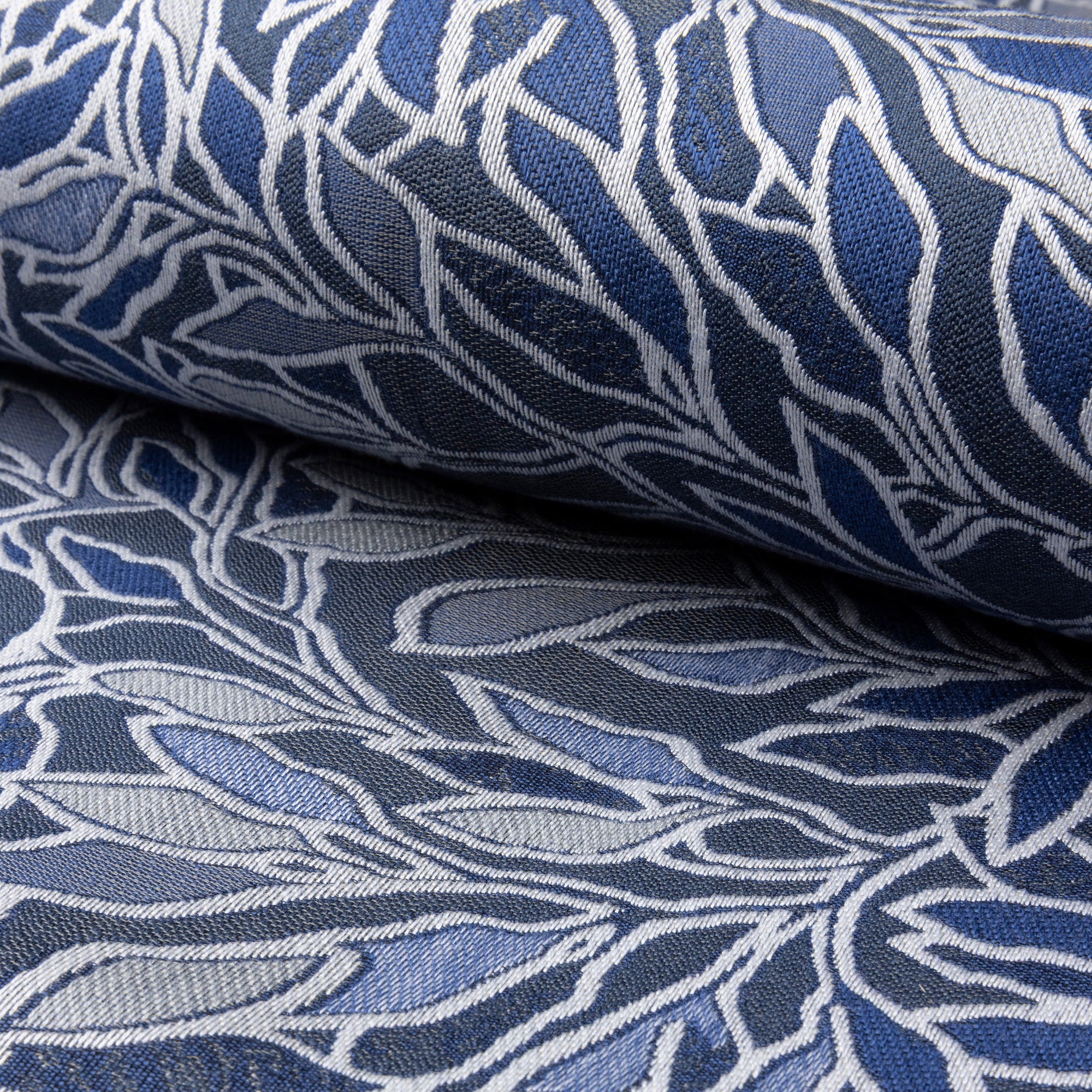 Blue and cream botanical leaf jacquard upholstery fabric by the yard, rolled bolt view