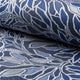 Blue and cream botanical leaf jacquard upholstery fabric by the yard, rolled bolt view