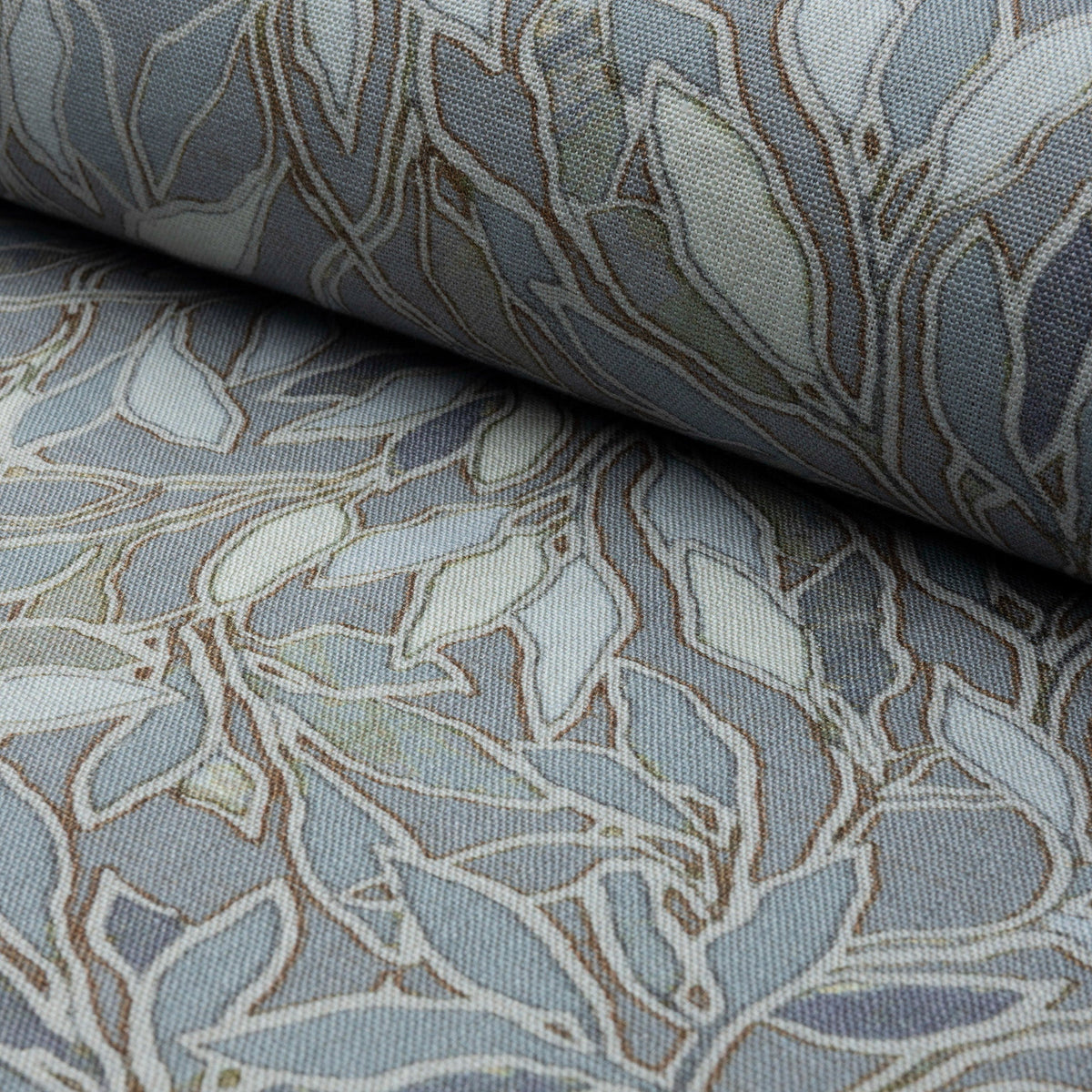 Blue botanical leaf printed linen fabric by the yard, rolled bolt view