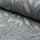 Blue botanical leaf printed linen fabric by the yard, rolled bolt view
