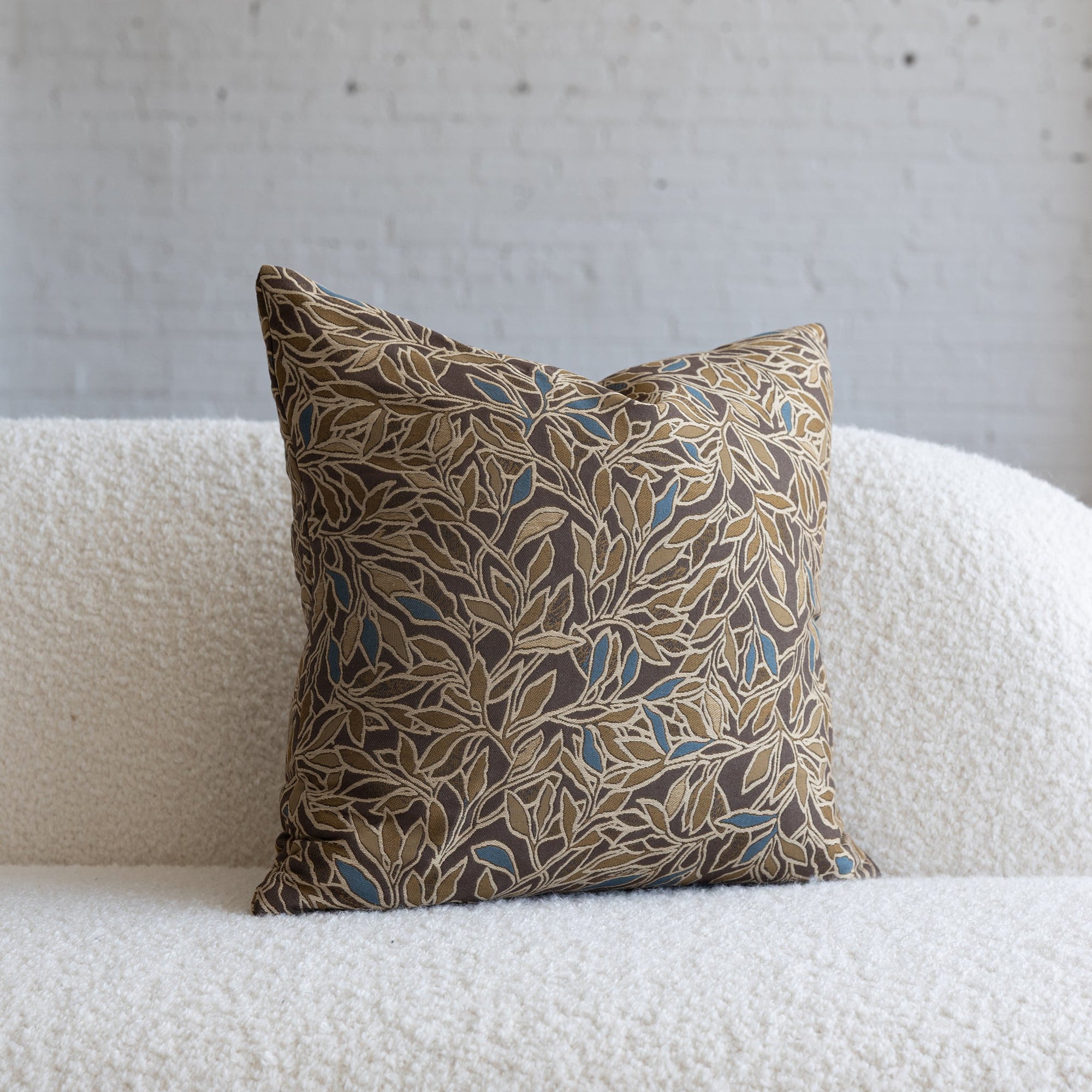 Dark brown with gold and blue botanical leaf jacquard throw pillow, 20-inch square