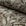 Brown and cream botanical leaf printed linen fabric by the yard, rolled bolt view