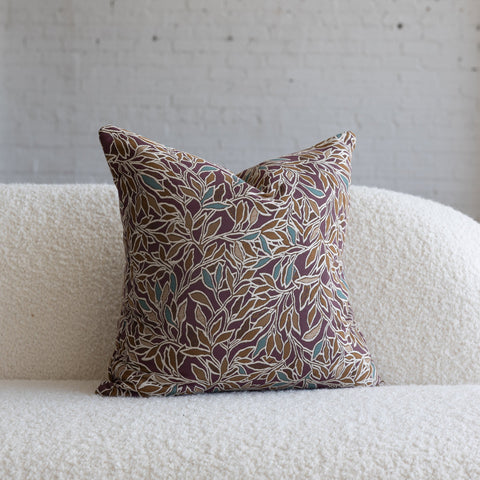 Deep maroon with teal botanical leaf jacquard throw pillow, 20-inch square