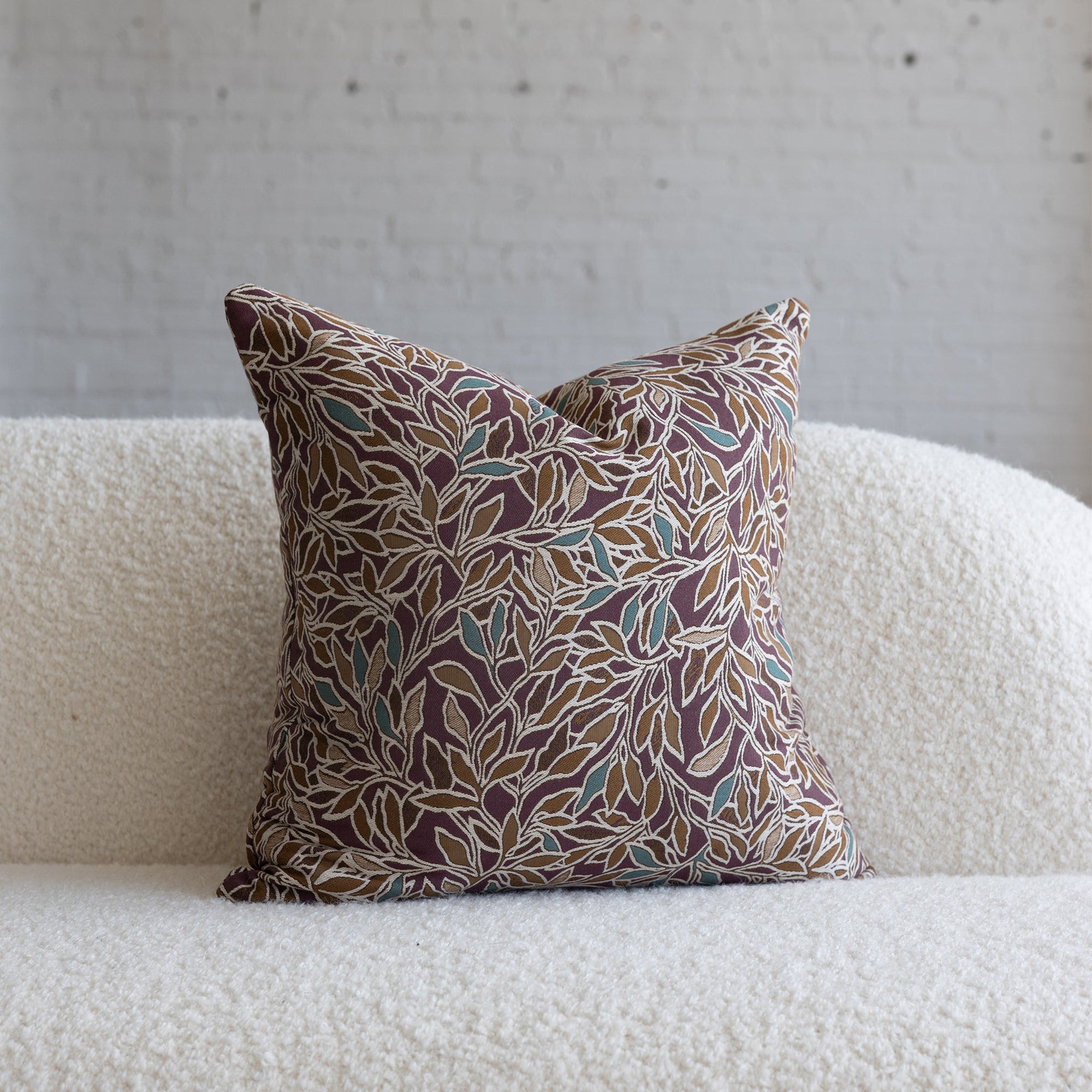 Deep maroon with teal botanical leaf jacquard throw pillow, 20-inch square