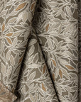 Sand botanical leaf jacquard upholstery fabric by the yard, folded showing drape and weight