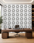 White and black stippled circle wallpaper installed in a home office