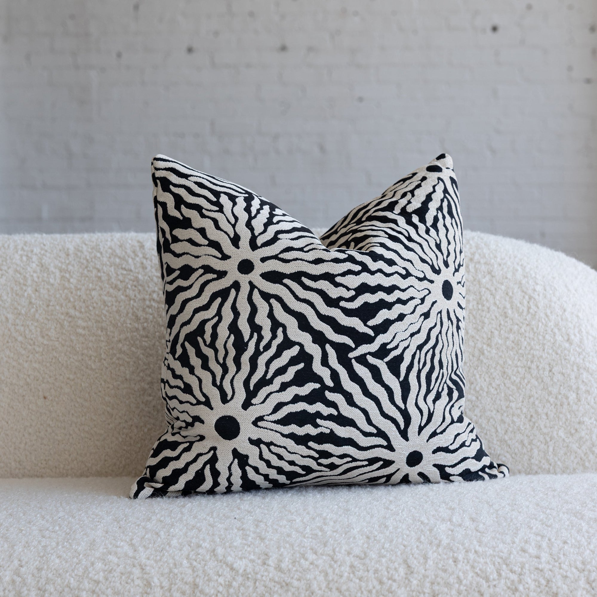 Black and ivory sunburst jacquard throw pillow, 20-inch square