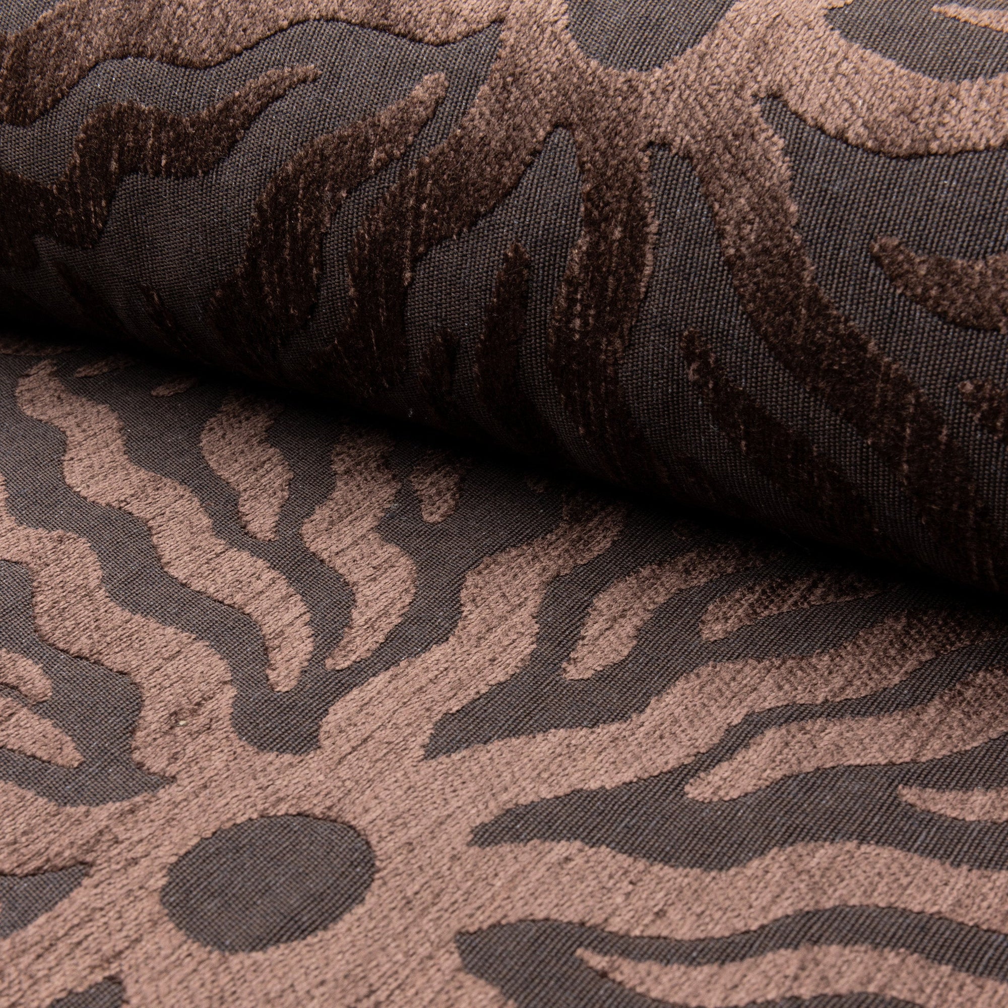 Dark brown sunburst jacquard upholstery fabric by the yard, rolled bolt view