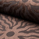 Dark brown sunburst jacquard upholstery fabric by the yard, rolled bolt view