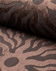 Dark brown sunburst jacquard upholstery fabric by the yard, rolled bolt view