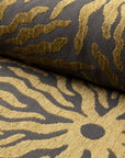 Gold and brown sunburst jacquard upholstery fabric by the yard, rolled bolt view