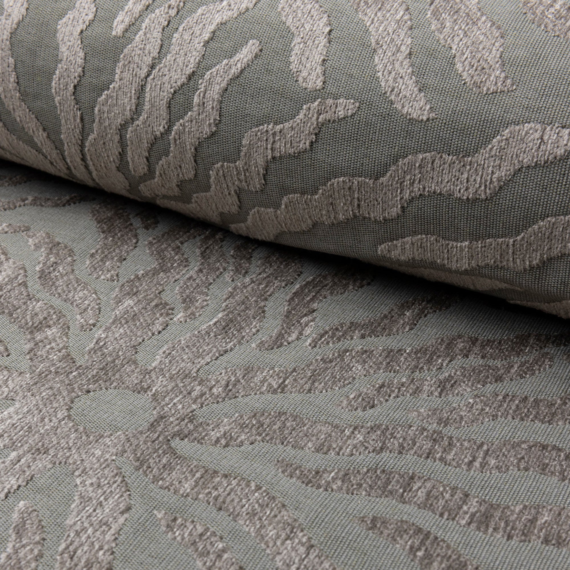Sage green sunburst jacquard upholstery fabric by the yard, rolled bolt view