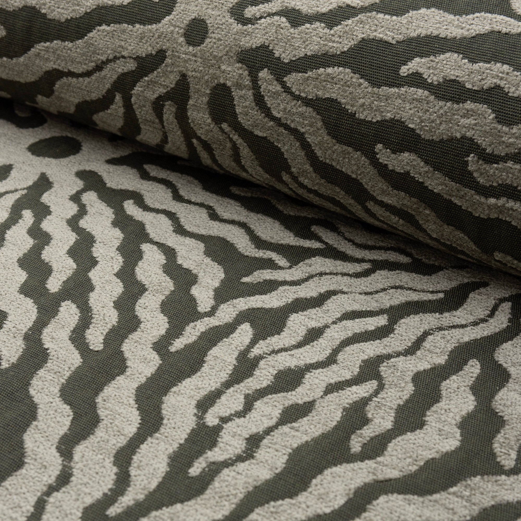 Gray sunburst jacquard upholstery fabric by the yard, rolled bolt view
