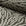 Gray sunburst jacquard upholstery fabric by the yard, rolled bolt view