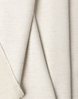 Cream chenille outdoor fabric by the yard, folded showing drape and weight