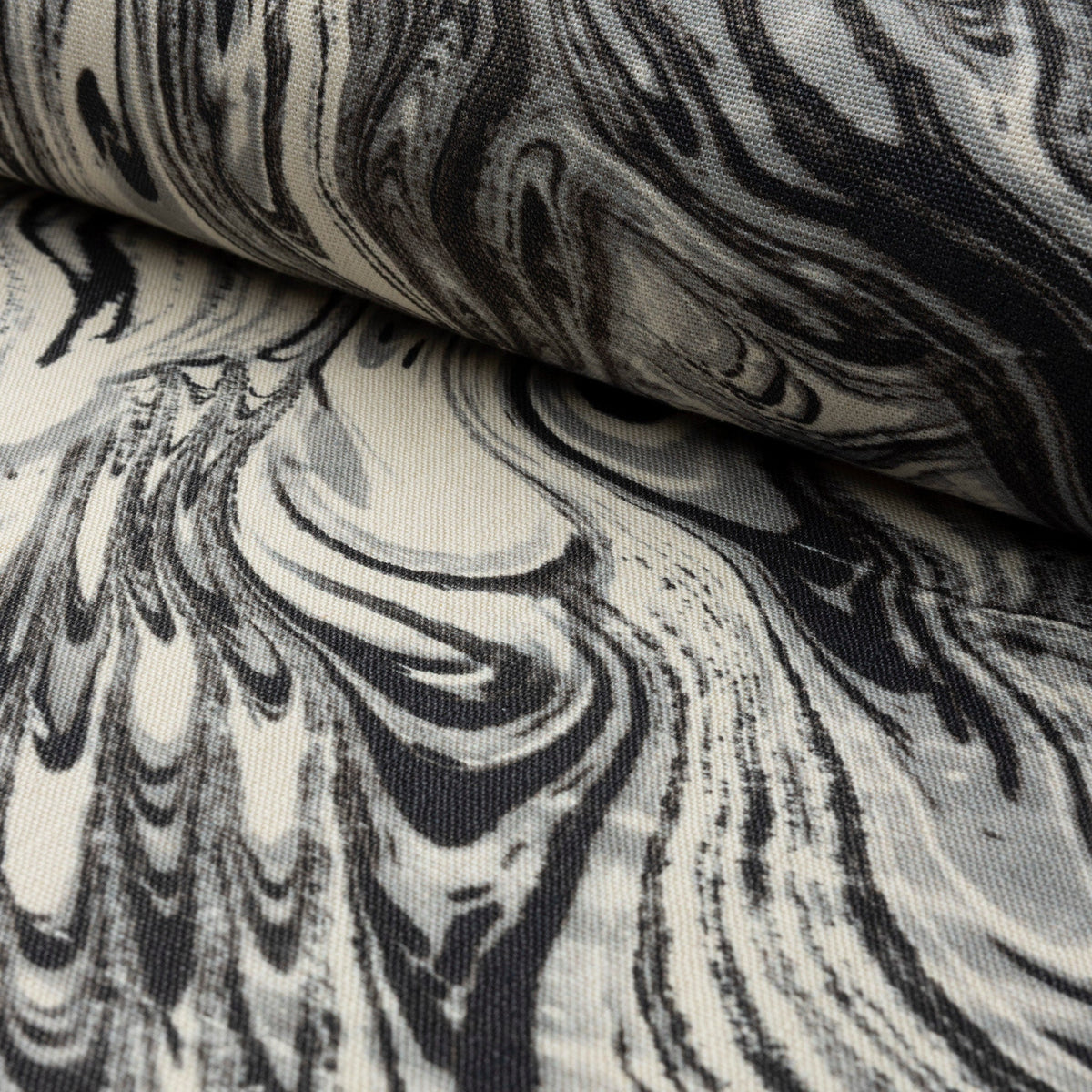 Black and cream marbled abstract linen fabric by the yard, rolled bolt view