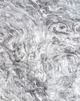Gray and silver marbled abstract linen fabric by the yard, draped to show pattern and scale