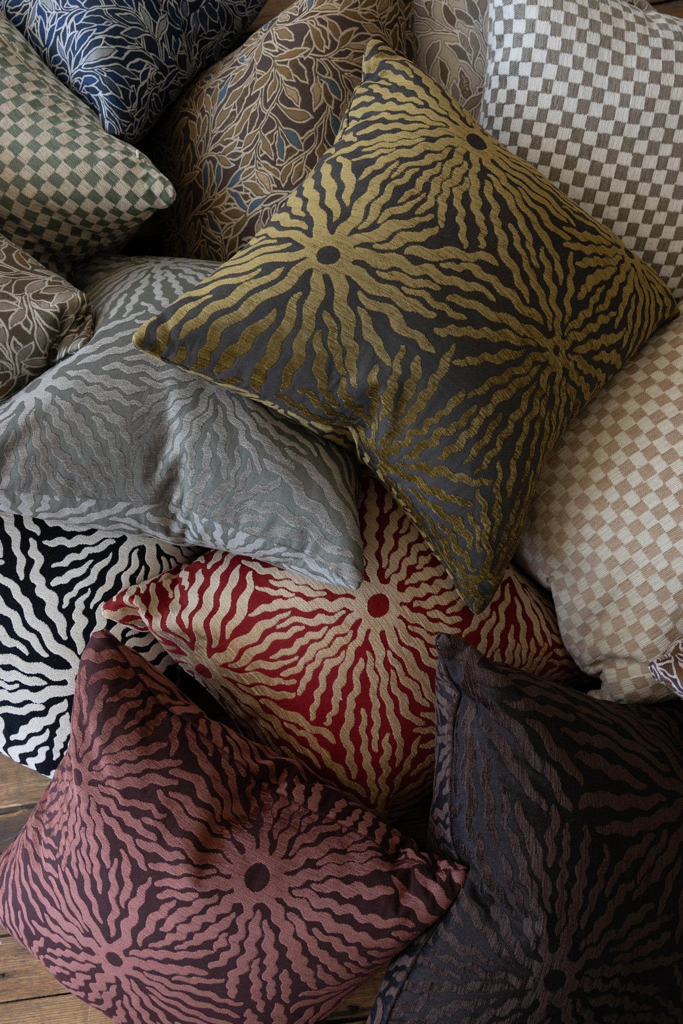Cream and gray botanical leaf throw pillow in Poppy Print Studio jacquard pillow collection arrangement