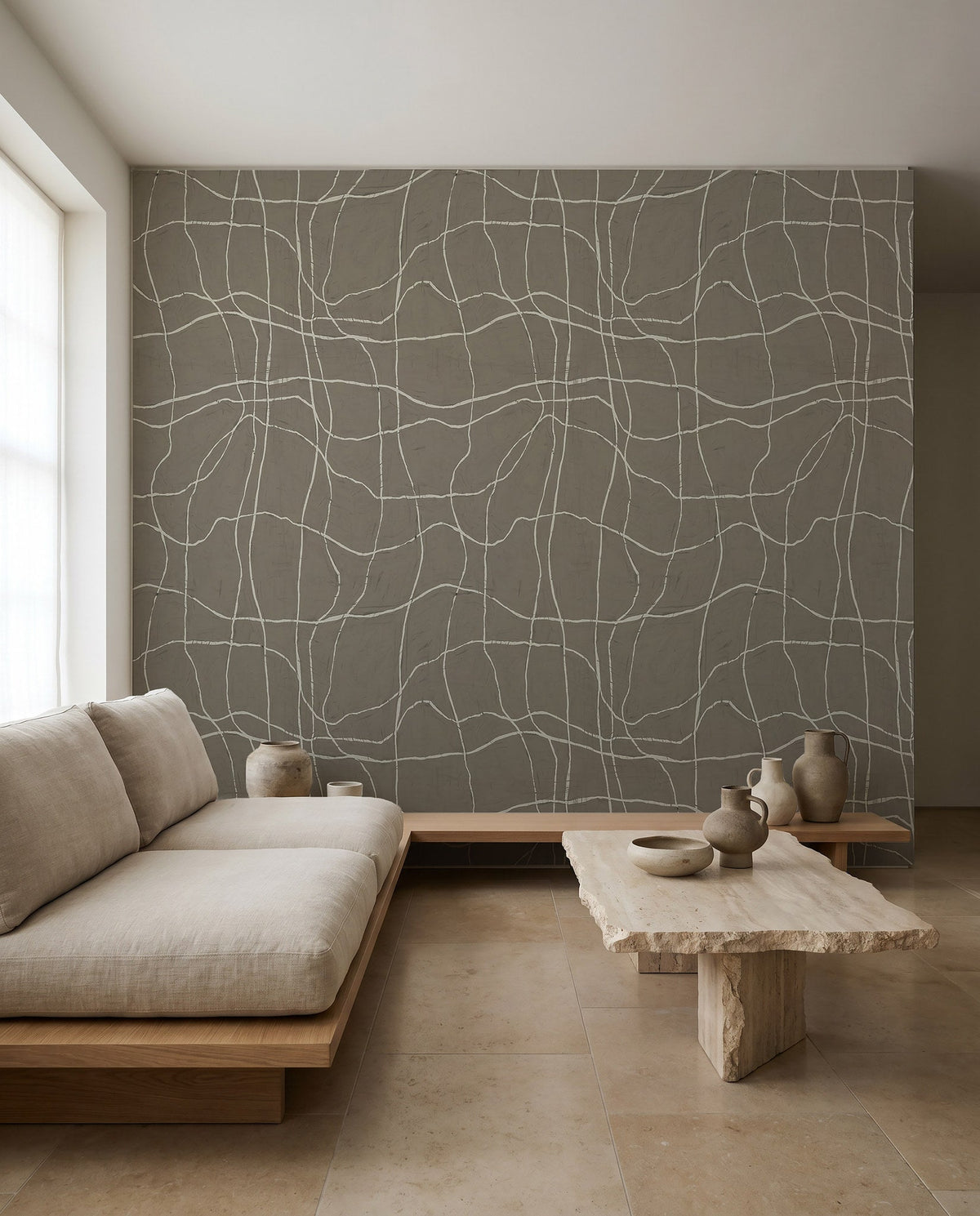White hand-drawn grid on gray-blue wallpaper installed in a minimalist living room