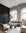 Luxury loft living room with white rug and modern sofa. Black and white square wallpaper