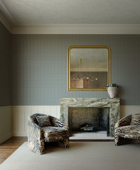 Elegant living room featuring black and white micro-checkered wallpaper, a marble fireplace, and plush tiger-print armchairs, creating a sophisticated contrast.