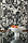 Black and white abstract wallpaper called Down the Rabbit Hole in a dining room setting, with a modern white bowl filled with oranges and an apple placed on a reflective glass table.